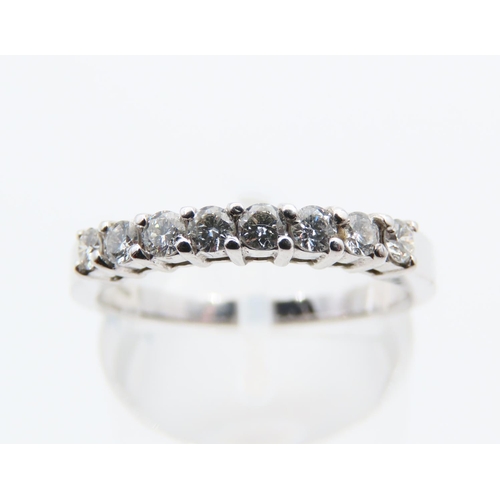 151 - Eight Diamond 9 Carat White Gold Half Eternity Ring Size N and a Half Total Diamond Weight Approxima... 