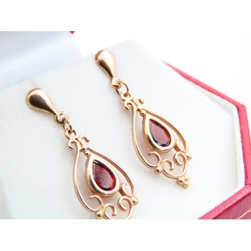 157 - Pair of Red Garnet Inset Drop Earrings 9 Carat Yellow Gold Each Earring 2.5cm Drop  Approximately At... 