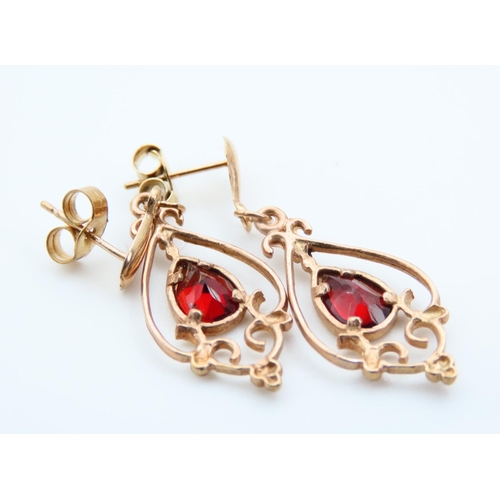 157 - Pair of Red Garnet Inset Drop Earrings 9 Carat Yellow Gold Each Earring 2.5cm Drop  Approximately At... 