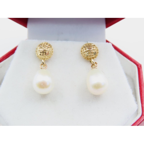 159 - Pair of Pearl Drop Earrings Set on 9 Carat Yellow Gold Each Earring 2cm Drop Attractively Detailed