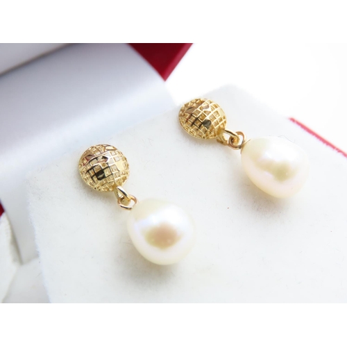 159 - Pair of Pearl Drop Earrings Set on 9 Carat Yellow Gold Each Earring 2cm Drop Attractively Detailed