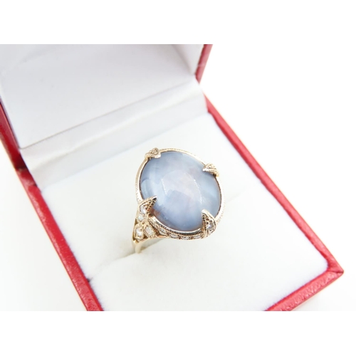 169 - Star Sapphire Cabochon Cut Centre Stone Ring Four Claw Setting Further Diamond Decoration to Surroun... 