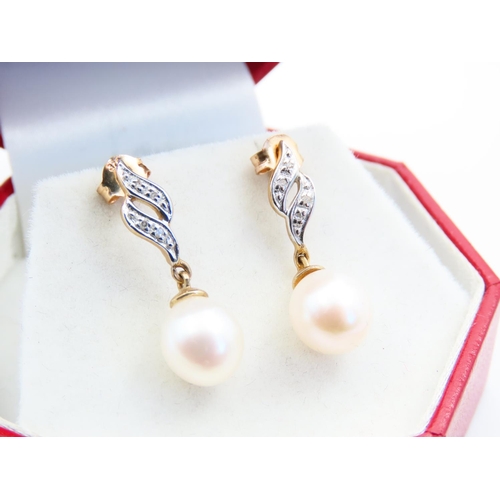 174 - Pair of Pearl and Diamond Set Ladies Drop Earrings Each 2cm High Mounted in 9 Carat Yellow Gold