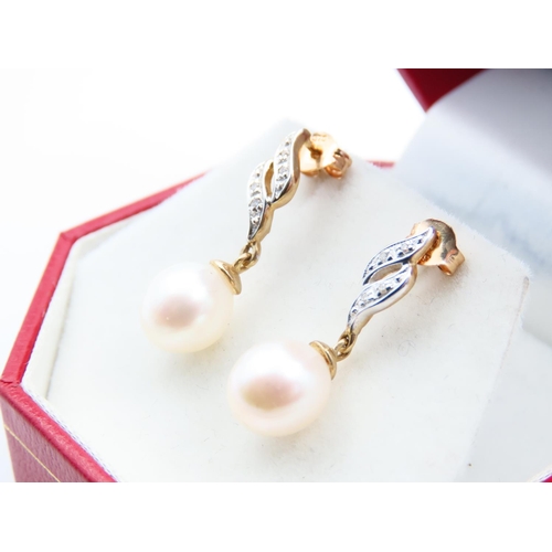 174 - Pair of Pearl and Diamond Set Ladies Drop Earrings Each 2cm High Mounted in 9 Carat Yellow Gold