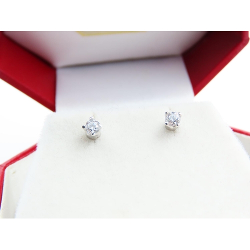 177 - Pair of 18 Carat White Gold Diamond Set Ladies Solitaire Earrings