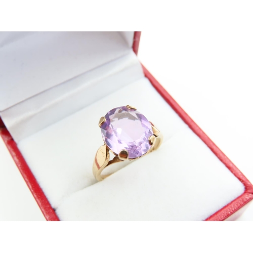 190 - Amethyst Cushion Cut Centre Stone Ring Mounted on 9 Carat Yellow Gold Band Ring Size J