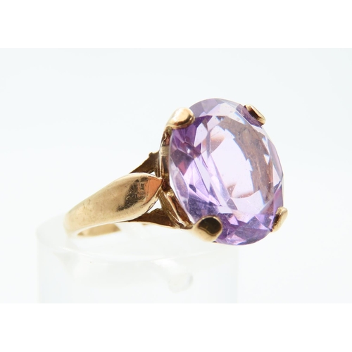 190 - Amethyst Cushion Cut Centre Stone Ring Mounted on 9 Carat Yellow Gold Band Ring Size J