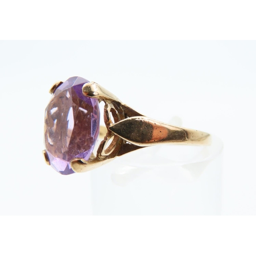 190 - Amethyst Cushion Cut Centre Stone Ring Mounted on 9 Carat Yellow Gold Band Ring Size J