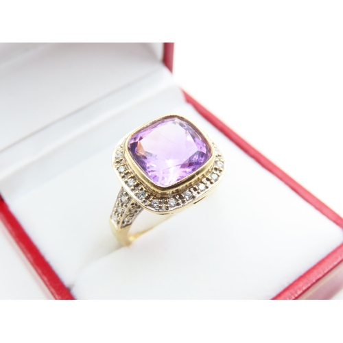 25 - Amethyst and Diamond Ladies Centre Stone Ring Mounted on 18 Carat Yellow Gold Band Further Diamond D... 