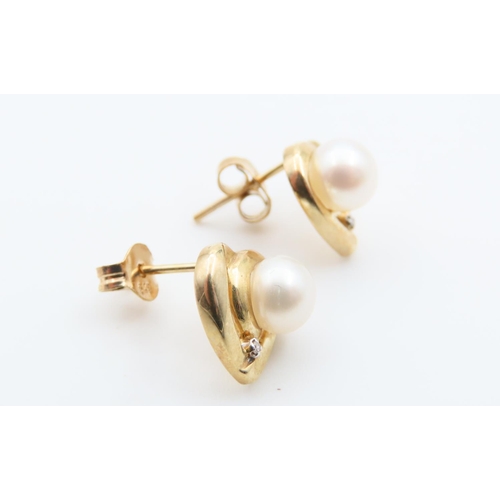 40 - Pair of Pearl Set 9 Carat Yellow Gold Mounted Earrings Each 1cm High