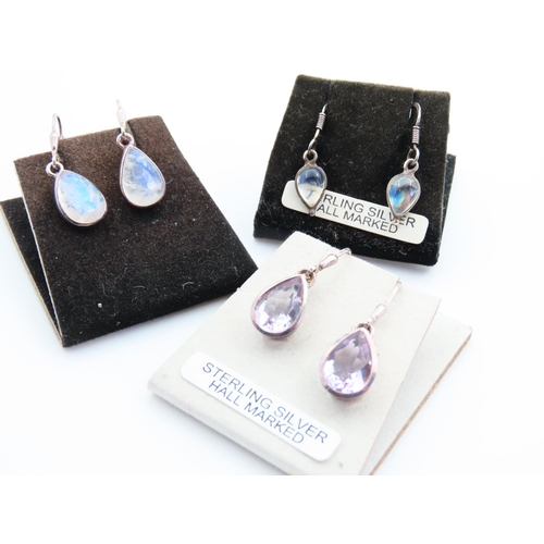 54 - Three Pairs of Silver Mounted Earrings with Moonstone and Amethyst Decoration