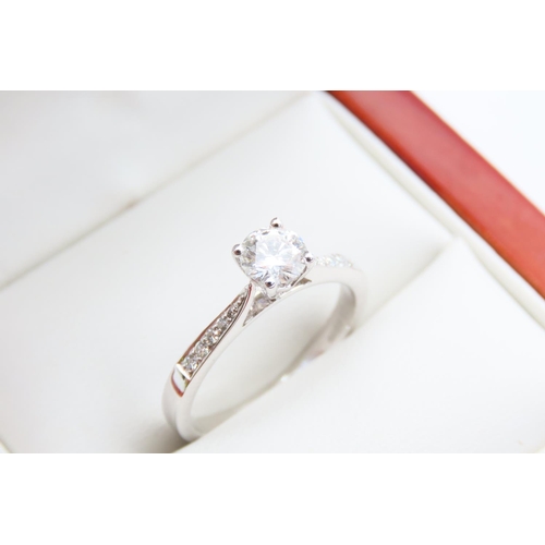 726 - Diamond Solitaire Ring Mounted on 18 Carat White Gold Band Further Inset with Diamonds Ring Size O