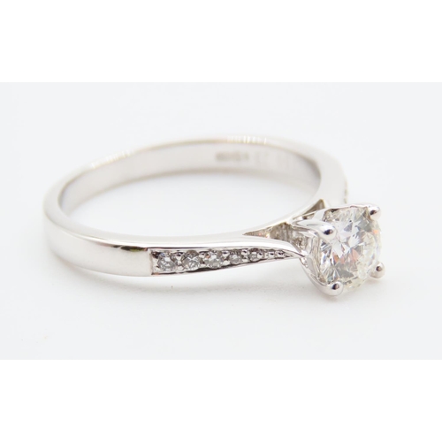 726 - Diamond Solitaire Ring Mounted on 18 Carat White Gold Band Further Inset with Diamonds Ring Size O