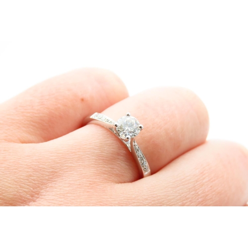 726 - Diamond Solitaire Ring Mounted on 18 Carat White Gold Band Further Inset with Diamonds Ring Size O