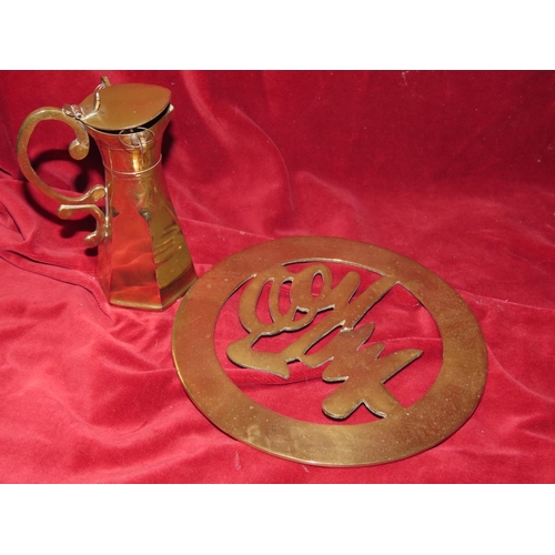 763 - Brass Pouring Jug and Trivet Two Items in Lot