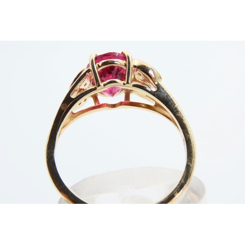 103 - Pink Tourmaline and Diamond 9 Carat Yellow Gold Ring Size N and a Half