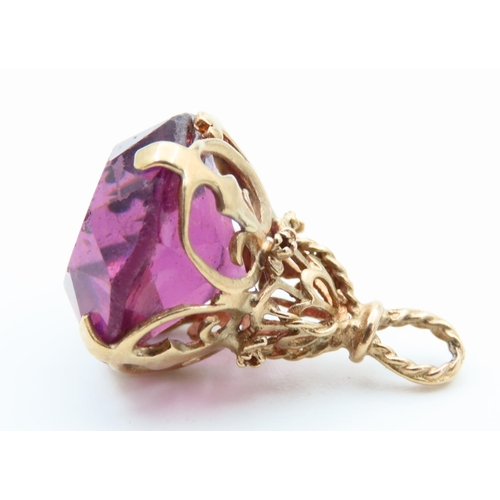 112 - Amethyst Facet Cut 9 Carat Yellow Gold Mounted Fob Pierced Decoration Attractively Detailed 3cm Drop