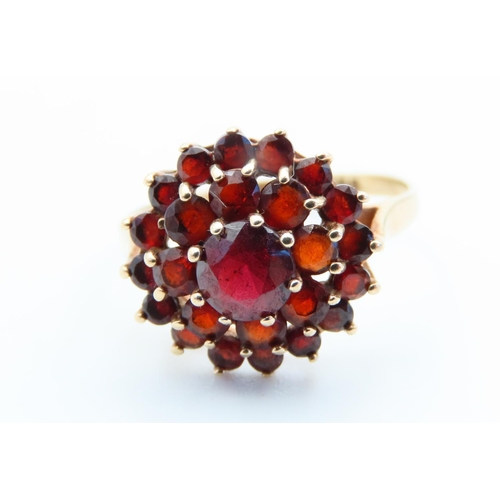 115 - Red Garnet Cluster Ring Starburst Form Mounted on 9 Carat Yellow Gold Band Ring Size O and a Half