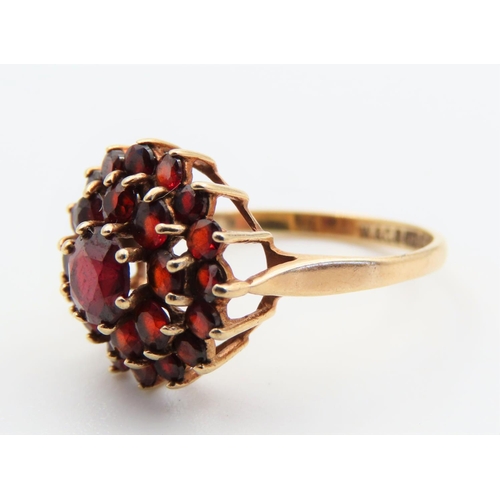 115 - Red Garnet Cluster Ring Starburst Form Mounted on 9 Carat Yellow Gold Band Ring Size O and a Half