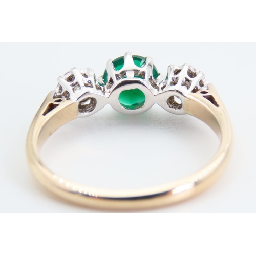 16 - Emerald and Diamond Ladies Ring Mounted on 9 Carat Yellow Gold Band