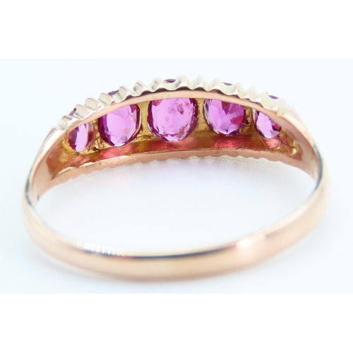 17 - Pink Tourmaline Five Stone Ring Mounted on 9 Carat Yellow Gold Band Size Q