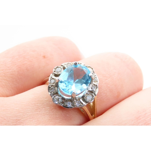 19 - Aquamarine and Diamond Cluster Ring Mounted on 9 Carat Yellow Gold Band Ring Size P