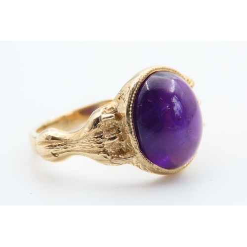 34 - Polished Amethyst Centre Stone Ring Mounted on 9 Carat Yellow Gold Band Ring Size O