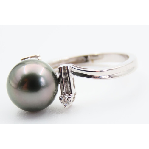 39 - 9 Carat White Gold Pearl and Diamond Ladies Ring Size O
