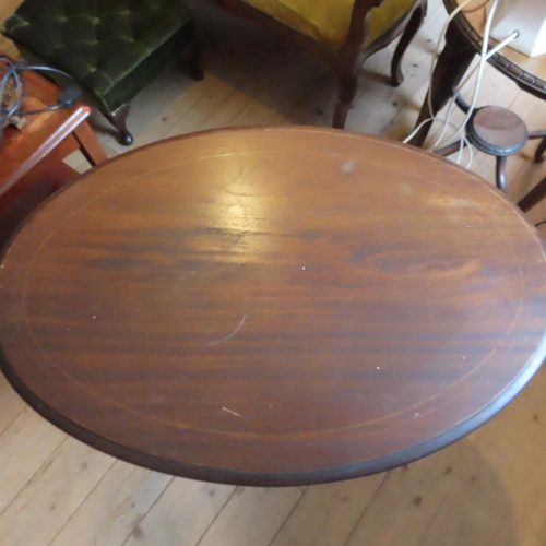 688 - Edwardian Mahogany Oval Form Occasional Table with Undertier Approximately 22 Inches Wide x 29 Inche... 