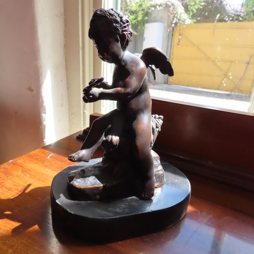 696 - Bronze Sculpture of Winged Cherub on Marble Oval Base Approximately 8 Inches High