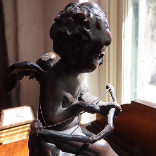 696 - Bronze Sculpture of Winged Cherub on Marble Oval Base Approximately 8 Inches High