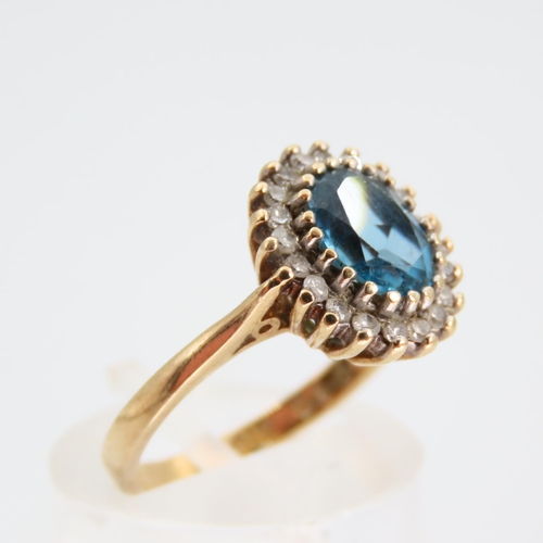 100 - Blue Topaz and Diamond Cluster Ring Mounted on 9 Carat Yellow Gold Band Ring Size L