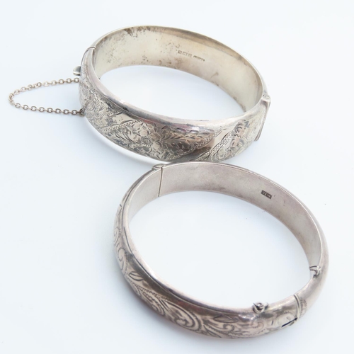 165 - Two Silver Ladies Wrist Bangles Hinge Form Incised Detailing to Both Inner Width 7cm Each