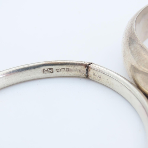 167 - Two Silver Bangles Hinge Form 7cm and 6.5cm Inner Diameter