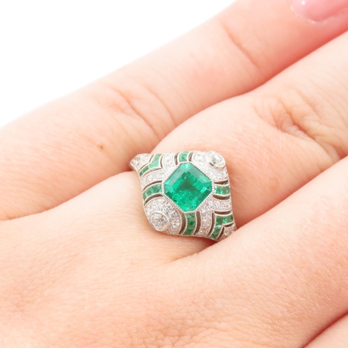 173 - Emerald and Diamond Ladies Ring of Attractive Design Mounted Platinum Band Ring Size M and a Half