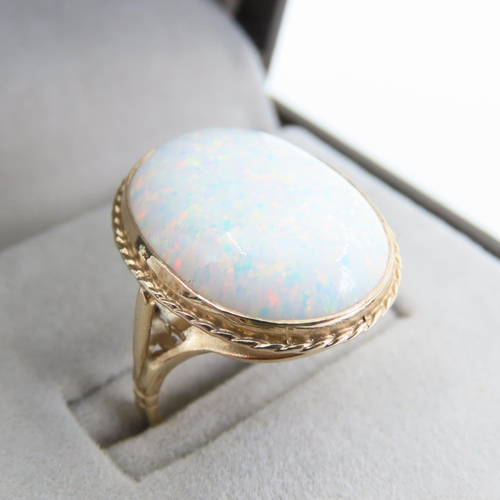 Opal Set Centerstone Ring Mounted on 9 Carat Yellow Gold Band Ring Size M and a Half