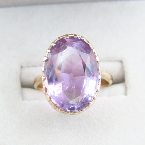 52 - Amethyst Oval Cut Center Stone Ring Mounted in 9 Carat Yellow Gold Band Size N