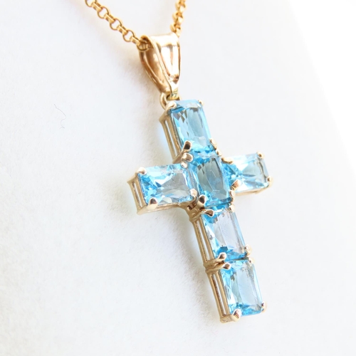 66 - Blue Topaz Six Stone 9 Carat Mounted Crucifix Pendant Necklace Cross 3cm Chain 9 Carat Yellow Gold 4... 