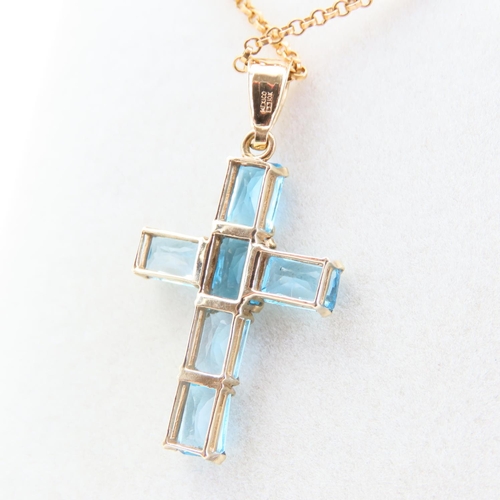 66 - Blue Topaz Six Stone 9 Carat Mounted Crucifix Pendant Necklace Cross 3cm Chain 9 Carat Yellow Gold 4... 