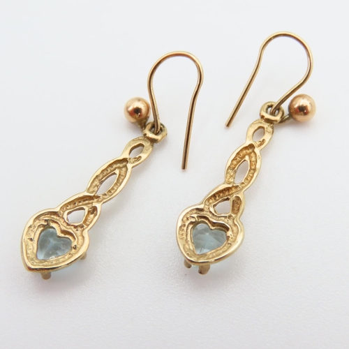 71 - Pair of Aquamarine Set 9 Carat Yellow Gold Drop Form Earrings Each 3cm High