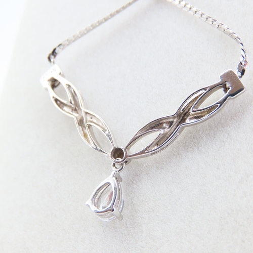 73 - 9 Carat White Gold Ladies Necklace Pear Cut Gemstone Possibly Pale Sapphire Necklace 32cm Long