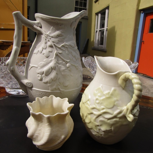 863 - Large Pouring Jug Fine Porcelain with Two Belleek Jugs Tallest Approximately 12 Inches High