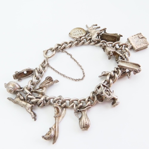 92 - Silver Charm Bracelet Laden with Various Silver Charms 16cm Long Charms Including Racing Car, Giraff... 