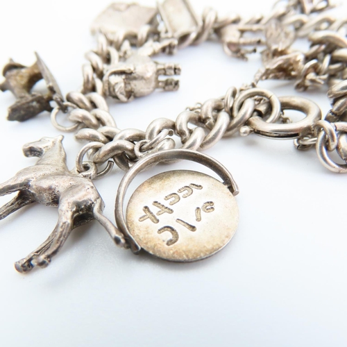 92 - Silver Charm Bracelet Laden with Various Silver Charms 16cm Long Charms Including Racing Car, Giraff... 