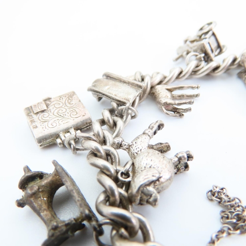 92 - Silver Charm Bracelet Laden with Various Silver Charms 16cm Long Charms Including Racing Car, Giraff... 