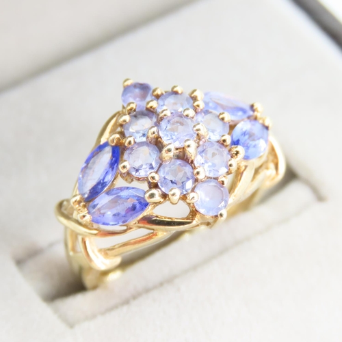 98 - Amethyst Cluster Ring Attractively Detailed Mounted on 9 Carat Yellow Gold Band Ring Size K