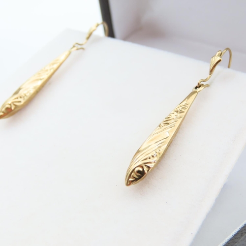 107 - Pair of 9 Carat Yellow Gold Drop Earrings Incised Decoration Each 4cm Drop