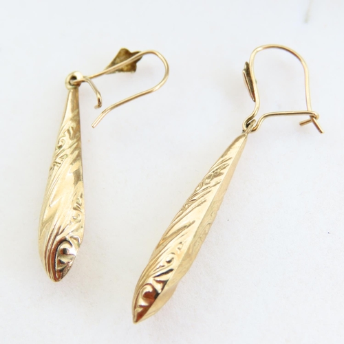 107 - Pair of 9 Carat Yellow Gold Drop Earrings Incised Decoration Each 4cm Drop