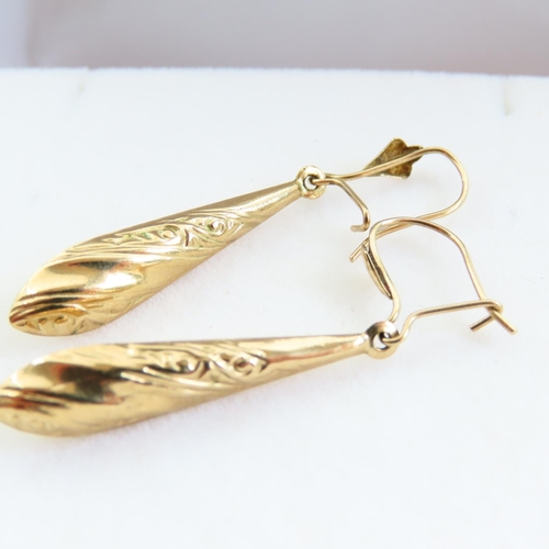 107 - Pair of 9 Carat Yellow Gold Drop Earrings Incised Decoration Each 4cm Drop