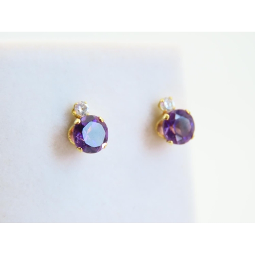 114 - Pair of Amethyst and Diamond Set 9 Carat Yellow Gold Earrings